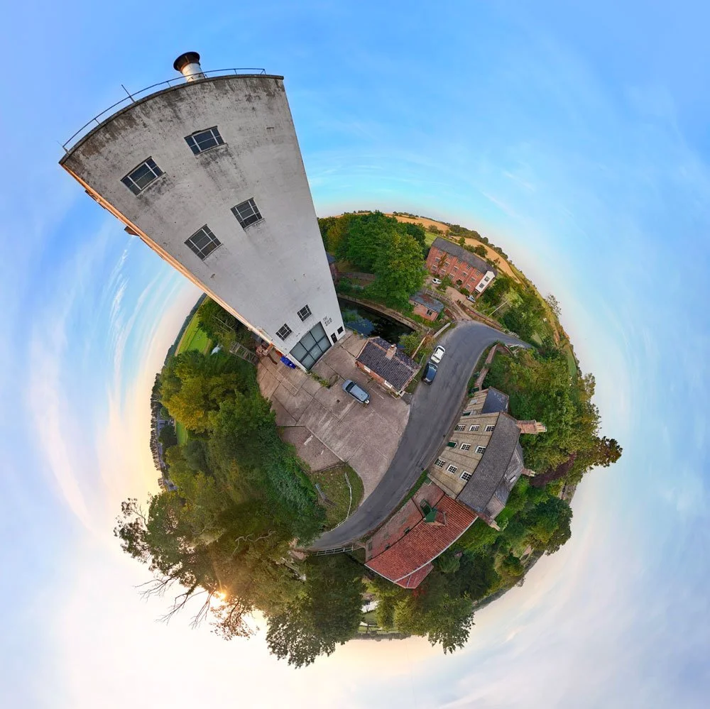 Fisheye aerial view of The Silo and its riverside grounds