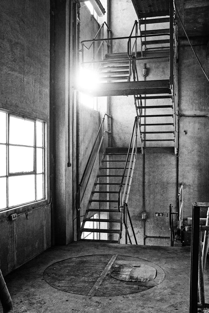 Steel stairs in window light